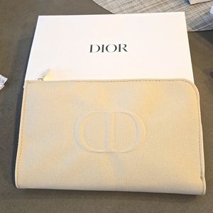 New in box never used DIOR  clutch / pouch neutral cream beige with CD Logo